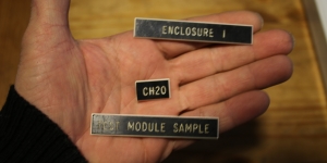 Cameron Smith holding Test Module placards, SAM at Biosphere 2