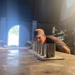 Kai, Trent preparing Unistrut mounting brackets for SAM at Biosphere 2