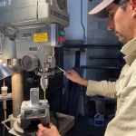 Kai, Trent preparing Unistrut mounting brackets for SAM at Biosphere 2