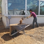Colleen Cooley shoveling dirt at SAM, Biosphere 2