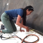 Colleen Cooley measuring placement of new studes in the Test Module lung, SAM at Biosphere 2