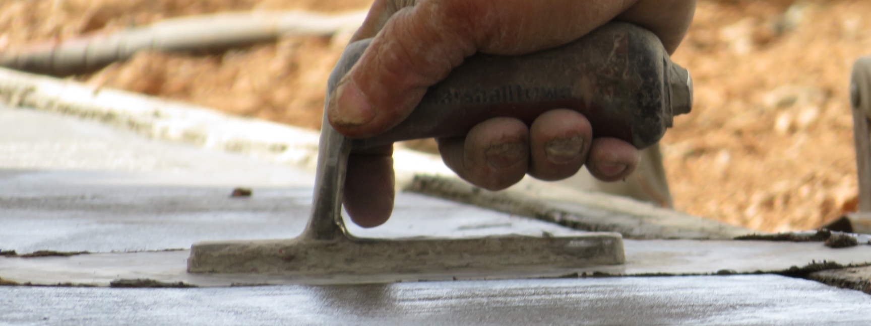 Knife work on the new SAM slab at Biosphere 2