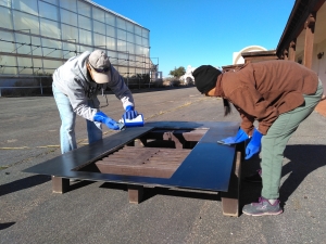 John Z and Colleen cleaning the airlock pressure plate at SAM, Biosphere 2