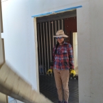 Colleen removes a foam panel from SAM at Biosphere 2