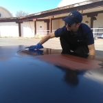 Elie cleaning the steel floor panels at SAM, Biosphere 2