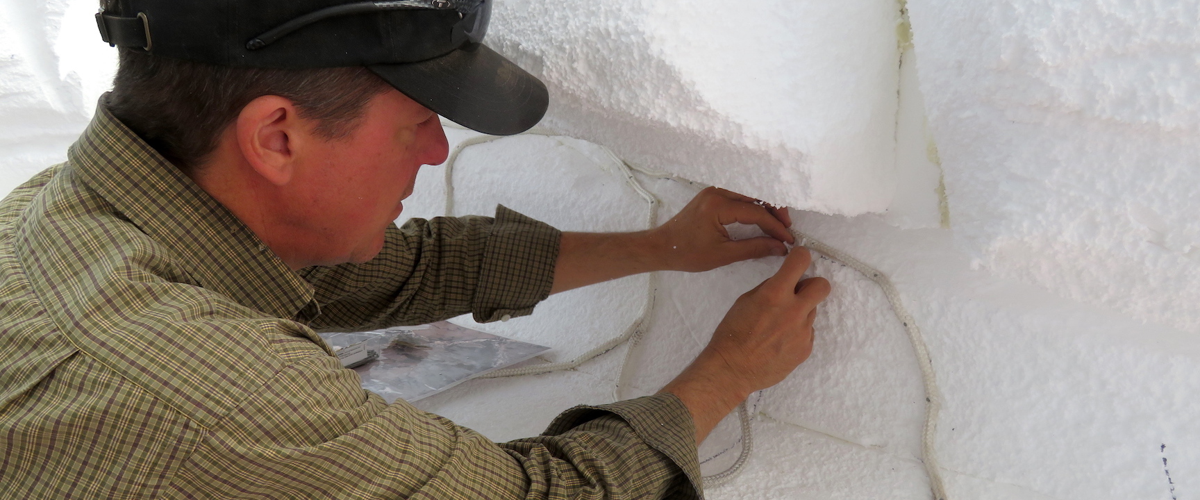 Director of Research for SAM Kai Staats applies nylon rope to define the pathway of gypsum.